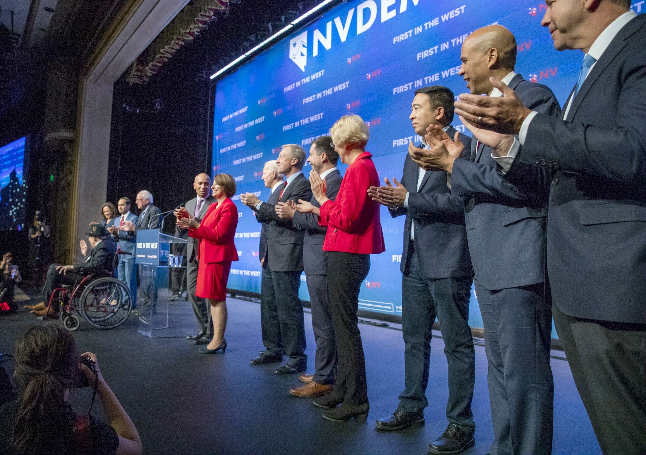 Democratic presidential candidates appear on stage with Harry Reid