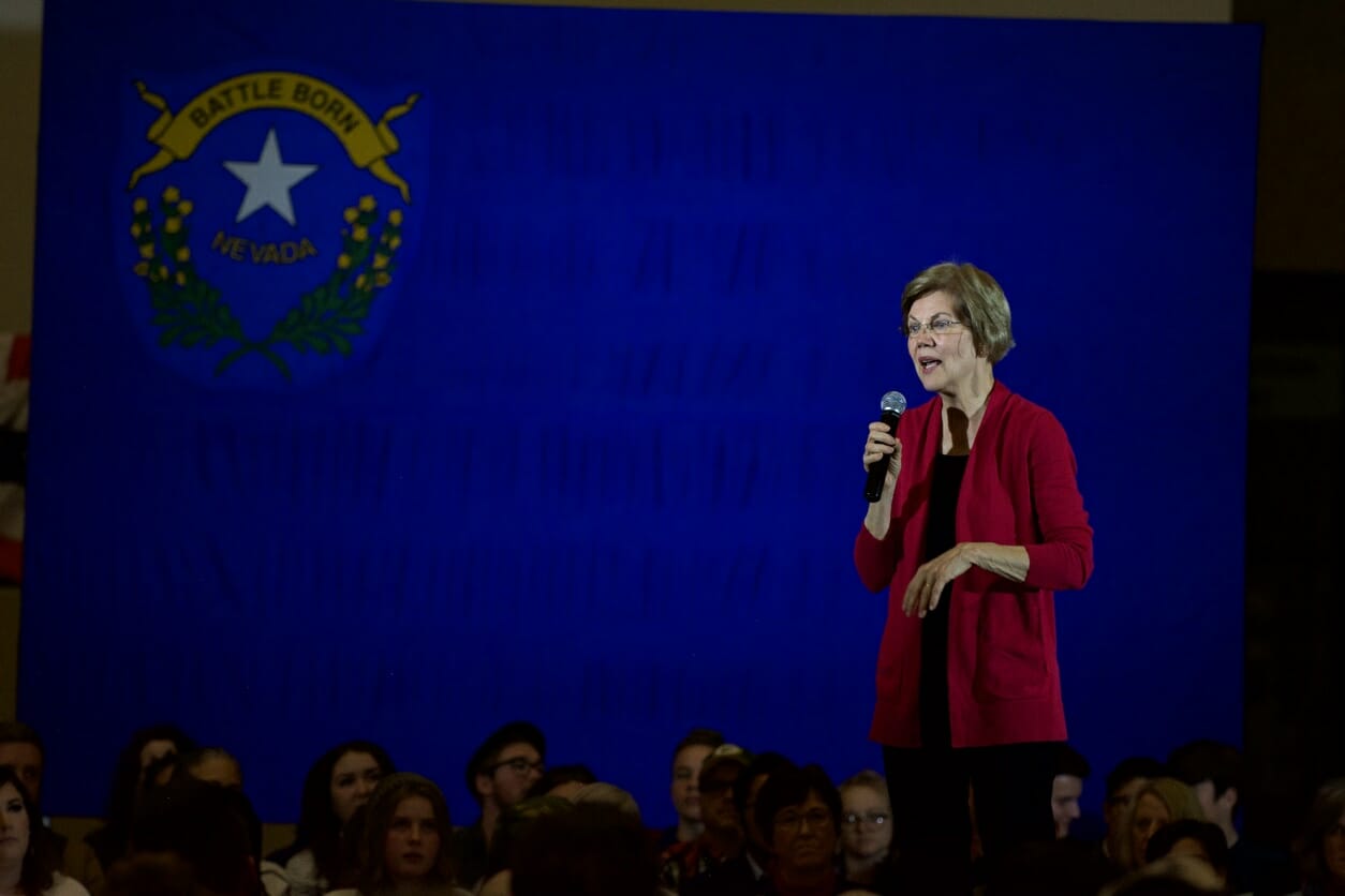 Warren speaking on stage