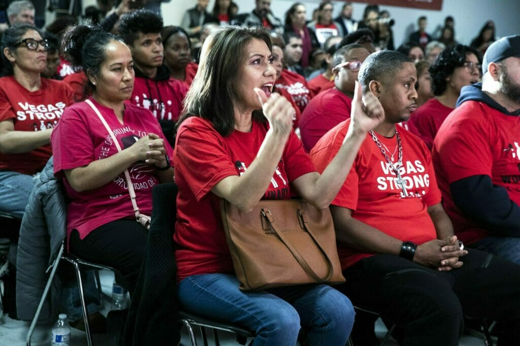 The attendees at a Culinary Union event all wearing red shirts