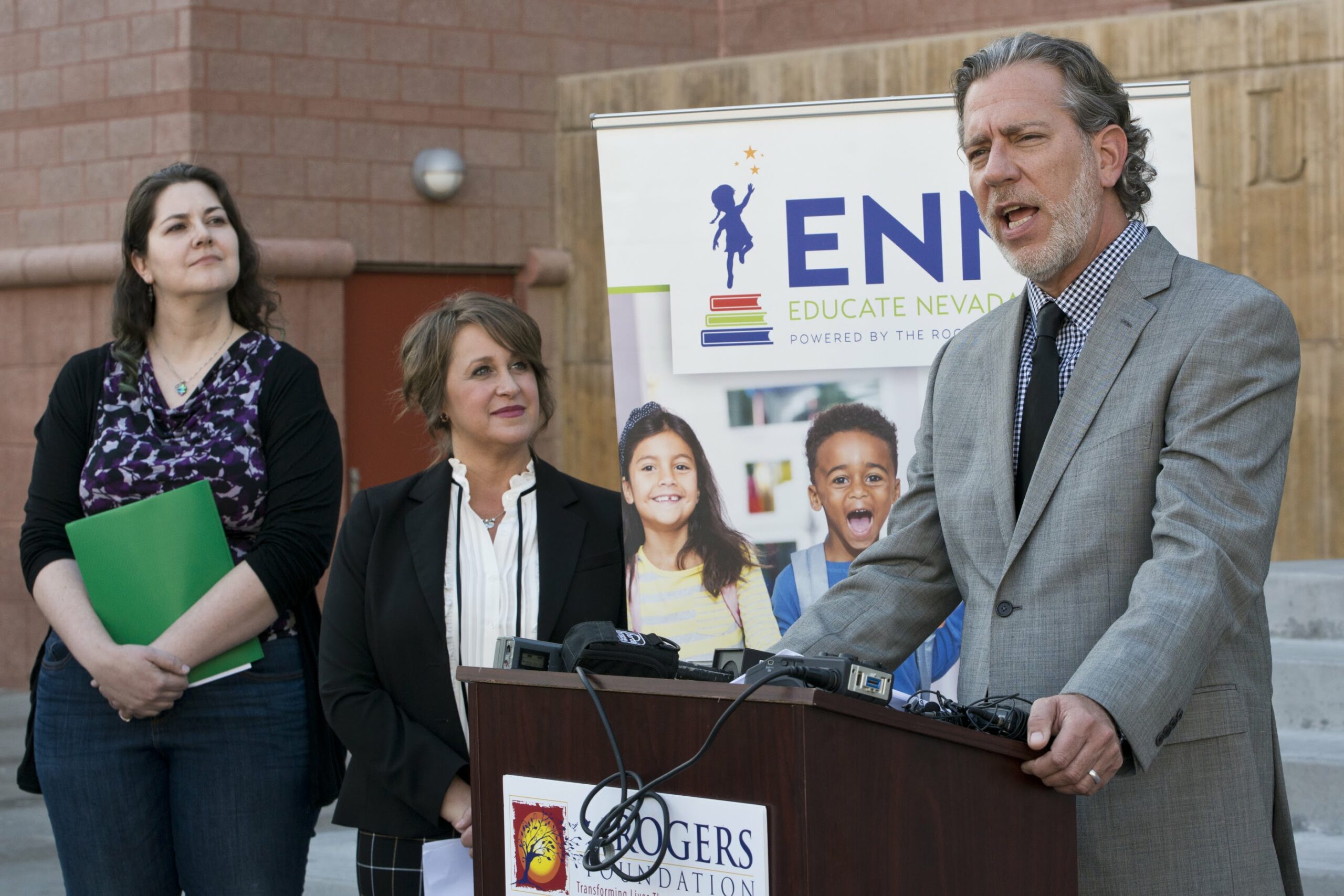 Attorney Bradley Schrager speaks with media