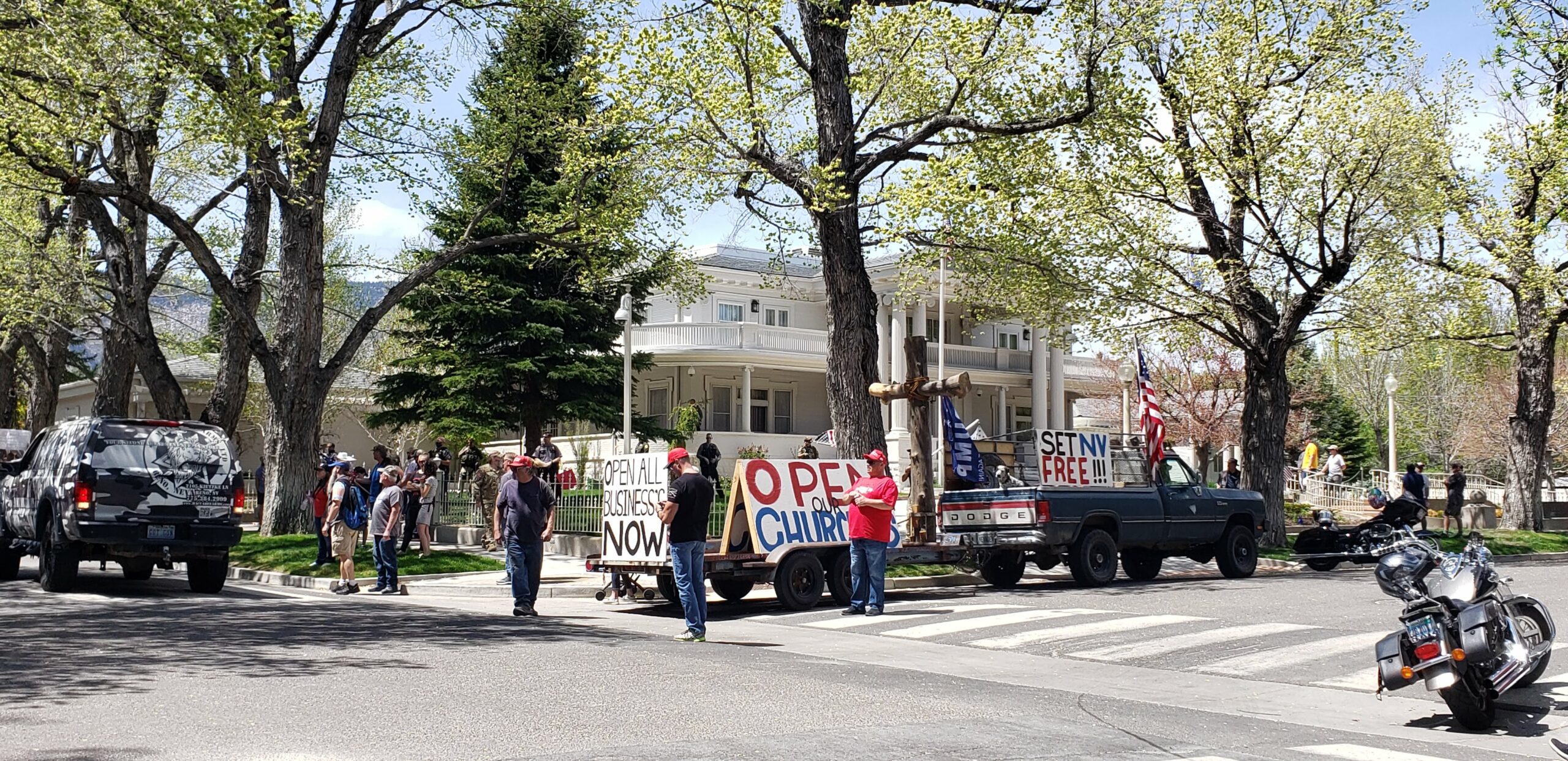 Protesters outside Governor's Mansion in Carson City attract