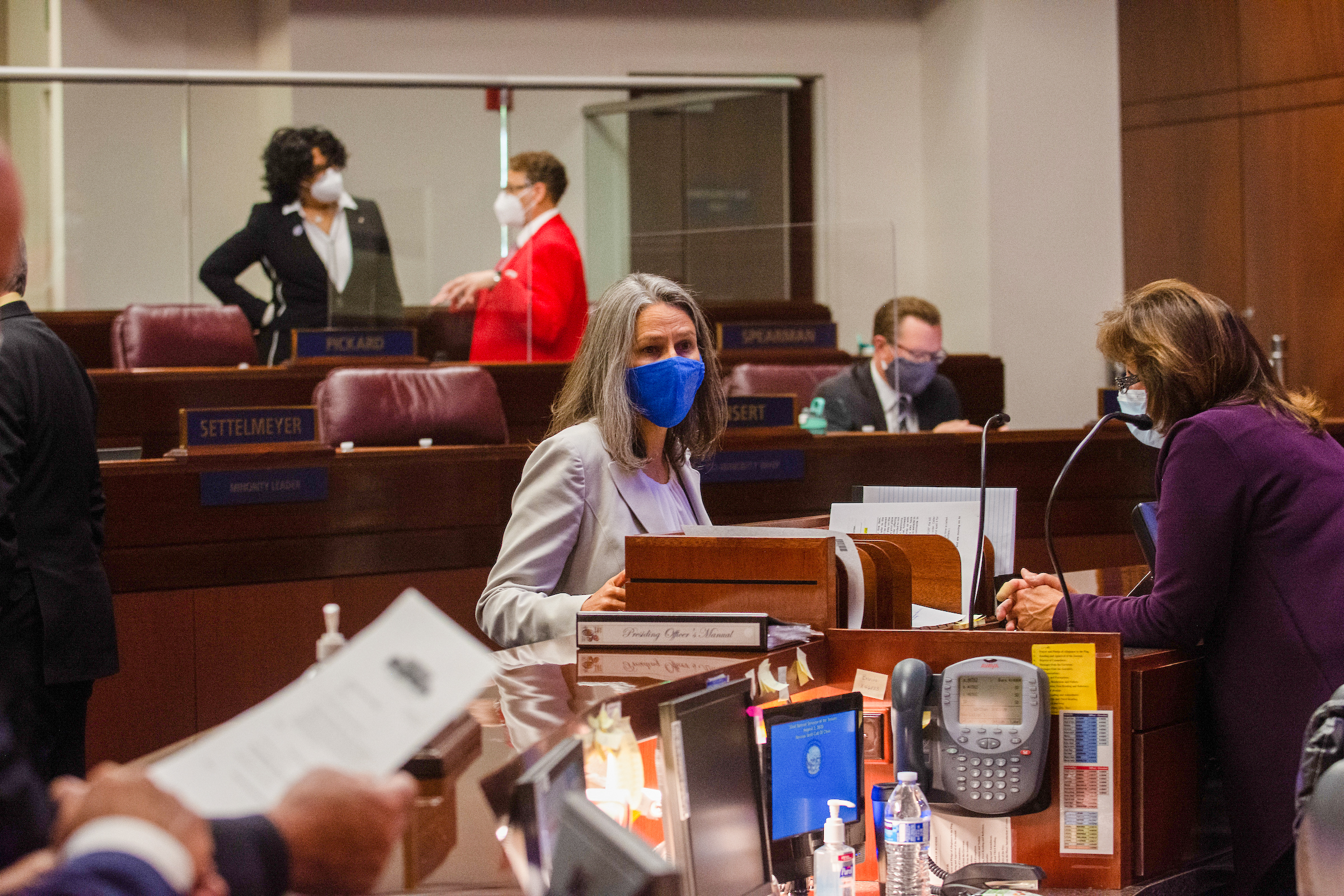 State Senator Julia Ratti speaks with Secretary of the Senate Claire Clift