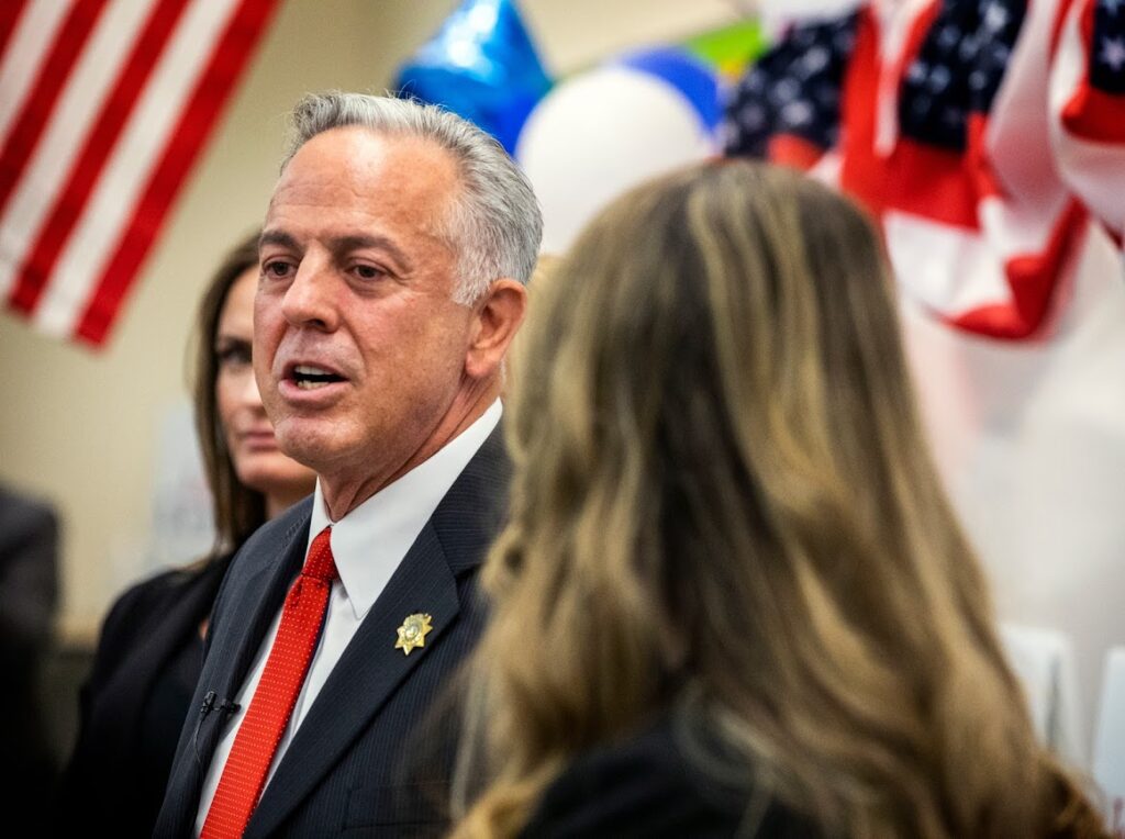 Newly elected sheriff Joe Lombardo,left, and his daughter Morgan