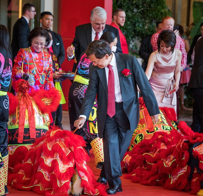 Genting Berhad Chairman KT Lim paints a dragon during the Resorts World Las Vegas grand opening party on June 24, 2021. (Jeff Scheid/The Nevada Independent)