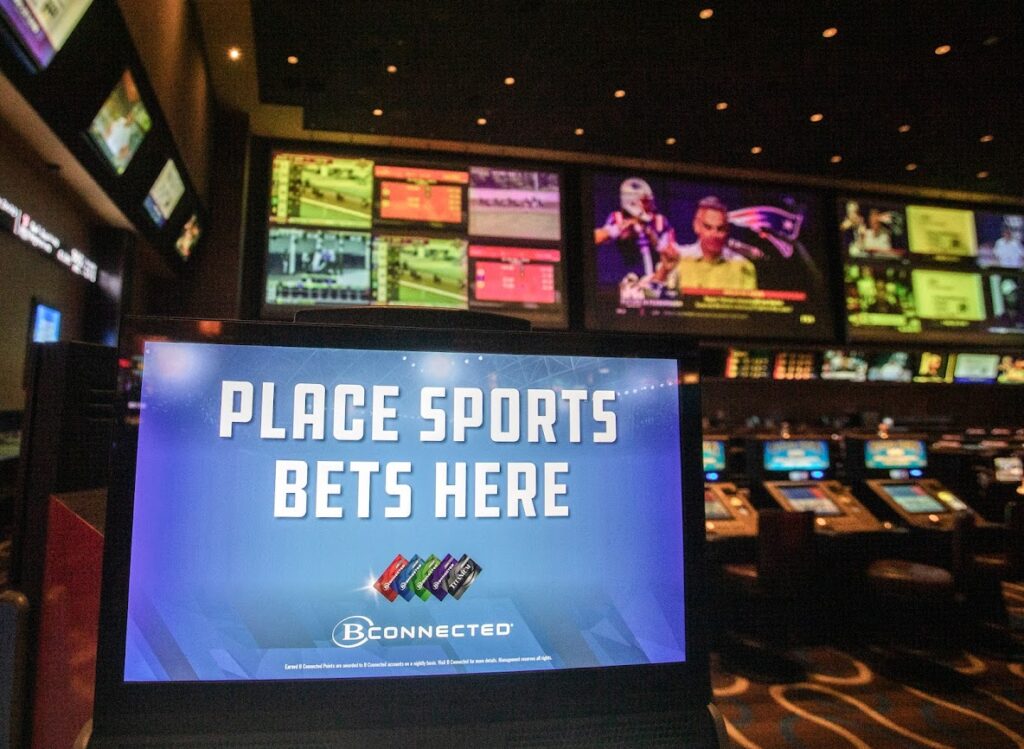 Harrah's sportsbook reopens with bet from Jonathan Ogden, Casinos & Gaming