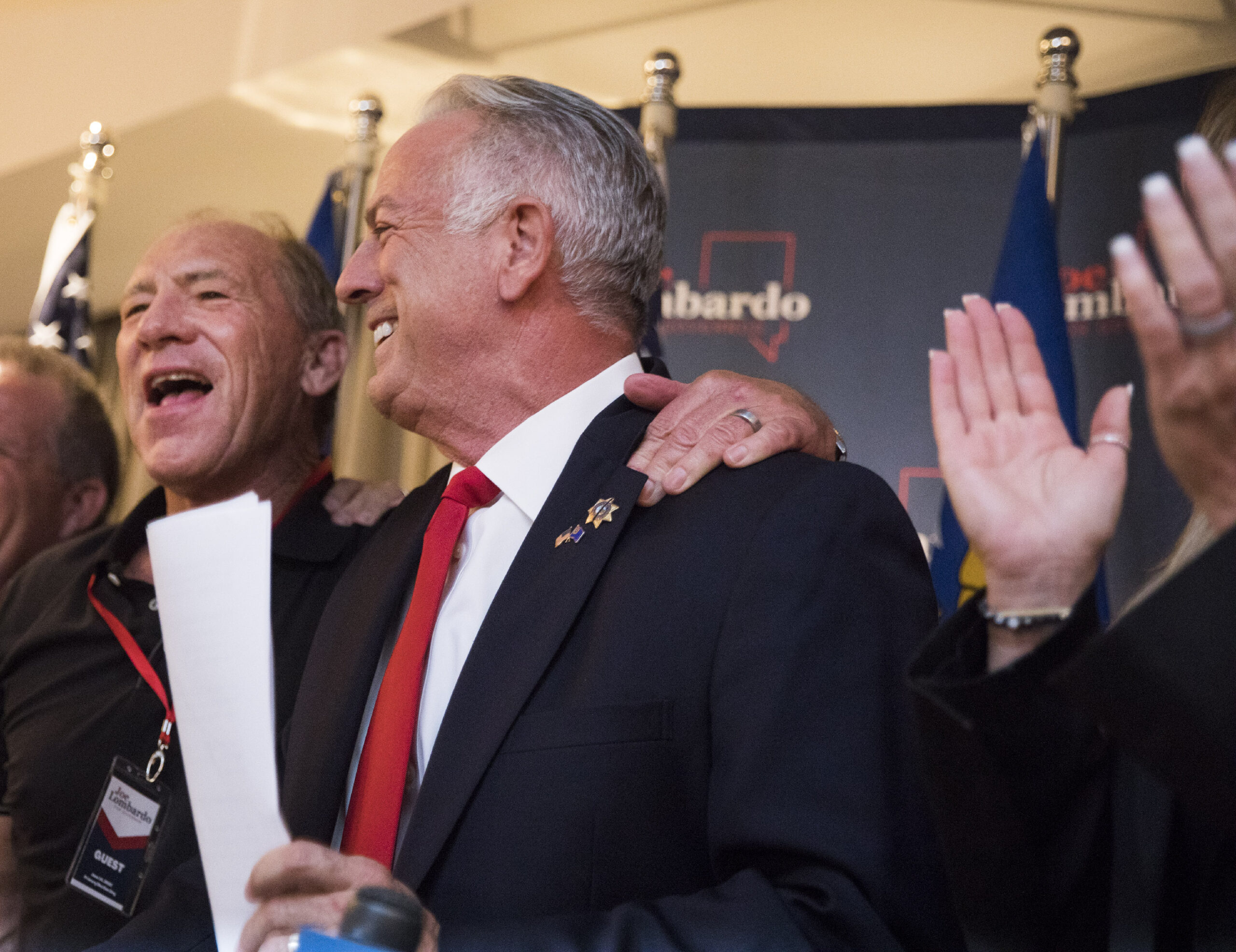 Newly elected sheriff Joe Lombardo,left, and his daughter Morgan