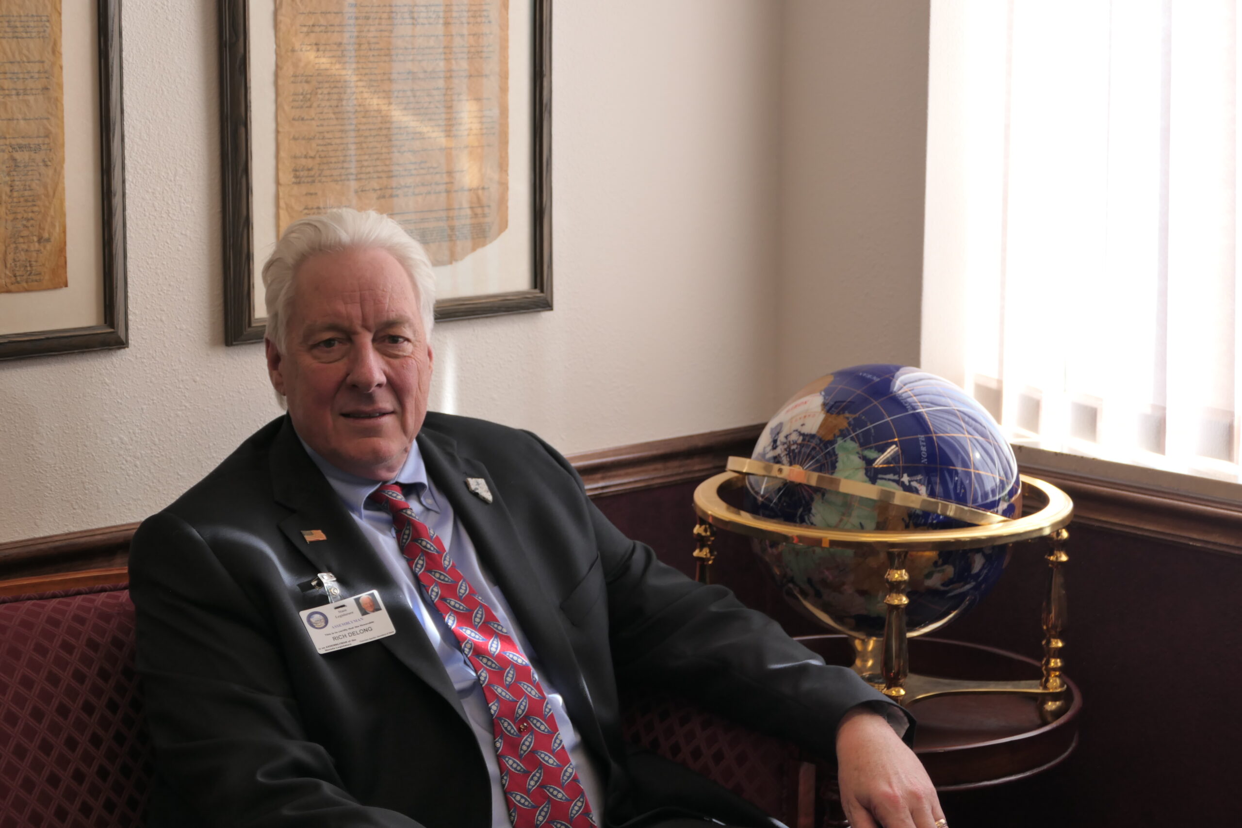 Assemblyman Rich DeLong sitting at his legislative office on Jan. 26, 2023. (Carly Sauvageau / The Nevada Independent)