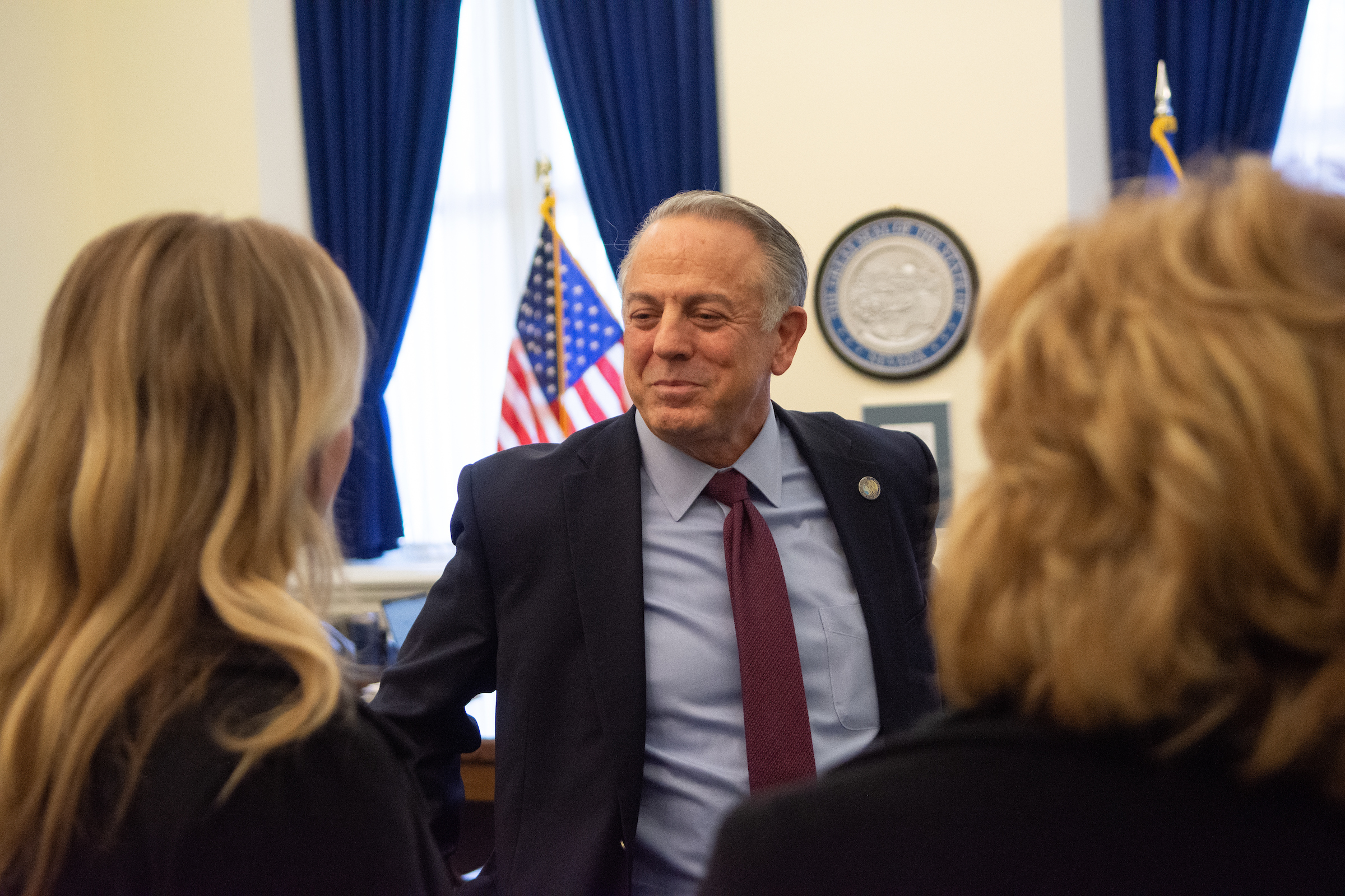 Governor Joe Lombardo meets with State Senators Melanie Scheible, Marilyn Dondero Loop and Ira Hansen inside his office during the first day of the 82nd legislative session in Carson City on Feb. 6, 2023. (David Calvert/The Nevada Independent).