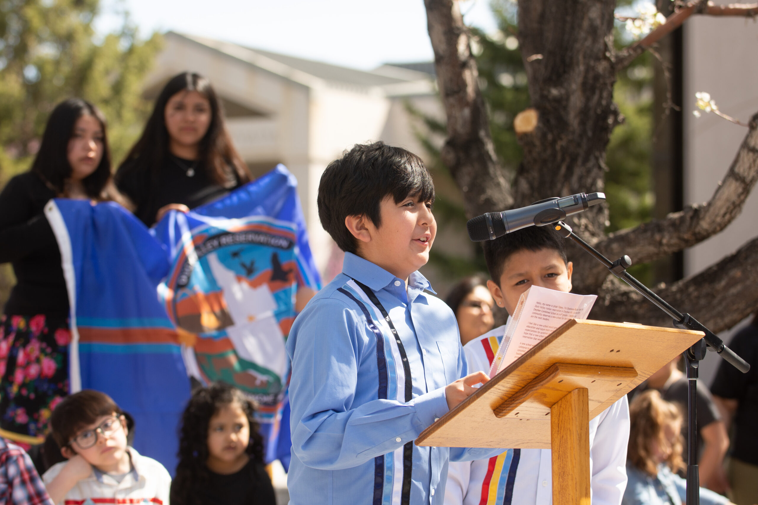 Landon Lee, a fifth grader at the Owyhee Combined School, located on the Shoshone-Paiute Tribes of the Duck Valley Indian Reservation in northeastern Nevada, reads an essay he wrote about what a new school would mean to him during a press conference outside the Legislature on Thursday, April 27, 2023 in Carson City.