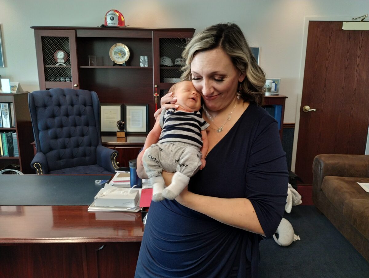 Senate Majority Leader Nicole Cannizzaro with her newborn son, Cole, inside the Legislature in Carson City on May 26, 2023. (Michelle Rindels/The Nevada Independent).