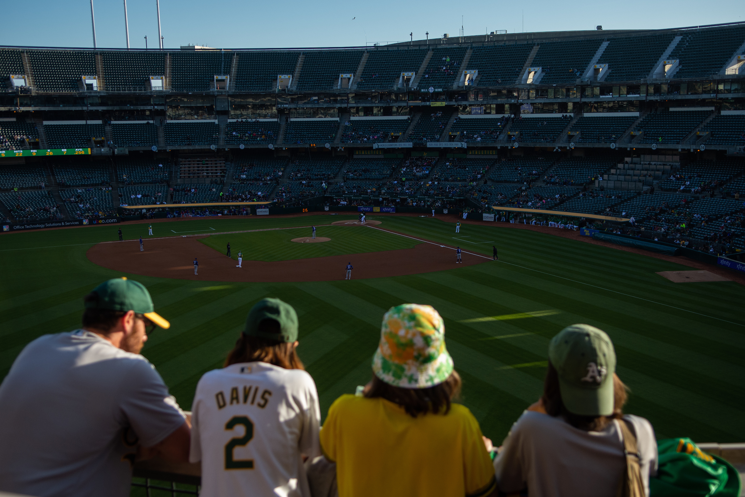 Oakland Athletics fans watch from the leftfield seats as the A's play the Texas Rangers at a near-empty Oakland Coliseum in Oakland, California on Friday, May 12, 2023. (David Calvert/The Nevada Independent).