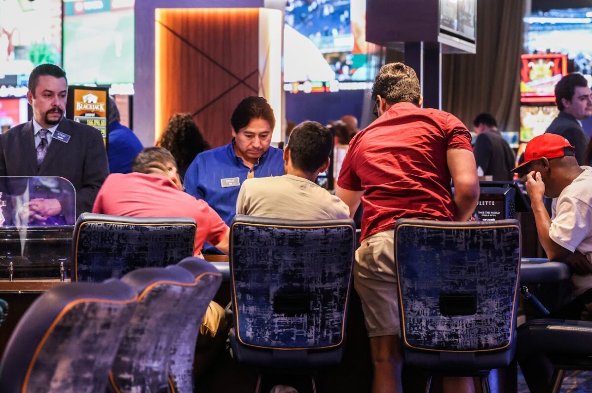 Blackjack players consider their bets at The Strat in downtown Las Vegas on Thursday, May 18, 2023. (Jeff Scheid/The Nevada Independent).