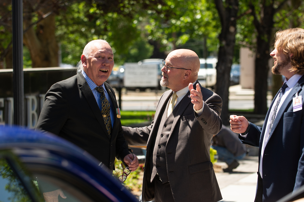 From left, Chairman Brian Mason of the Shoshone-Paiute Tribes of the Duck Valley Indian Reservation in northeastern Nevada, Senator Ira Hansen (R-Sparks) and lobbyist Will Adler outside the Legislature in Carson City on May 31, 2023. (David Calvert/The Nevada Independent).