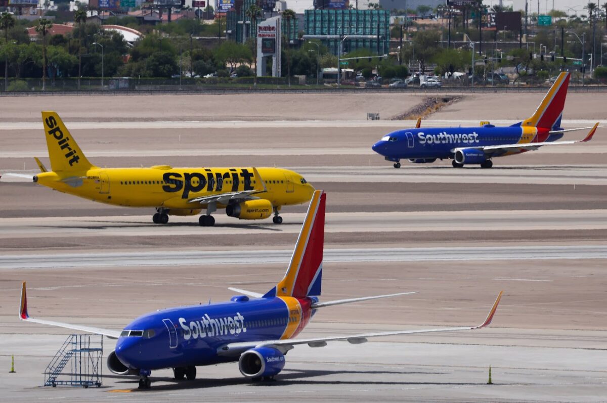 Flights from Spirit Airlines and Southwest Airlines are seen at Harry Reid International Airport on Wednesday, May 24, 2023. (Jeff Scheid/The Nevada Independent).