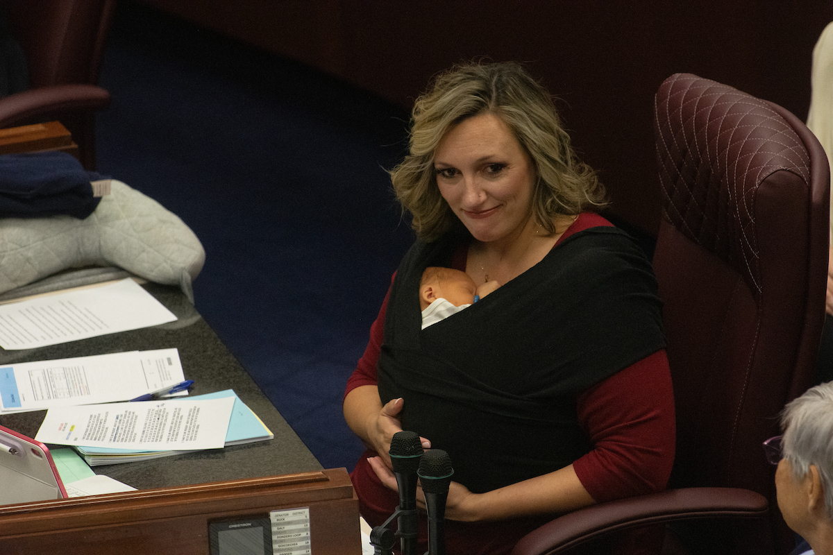 Senate Majority Leader Nicole Cannizzaro with her newborn son, Cole, inside the Legislature in Carson City on May 24, 2023. (David Calvert/The Nevada Independent).