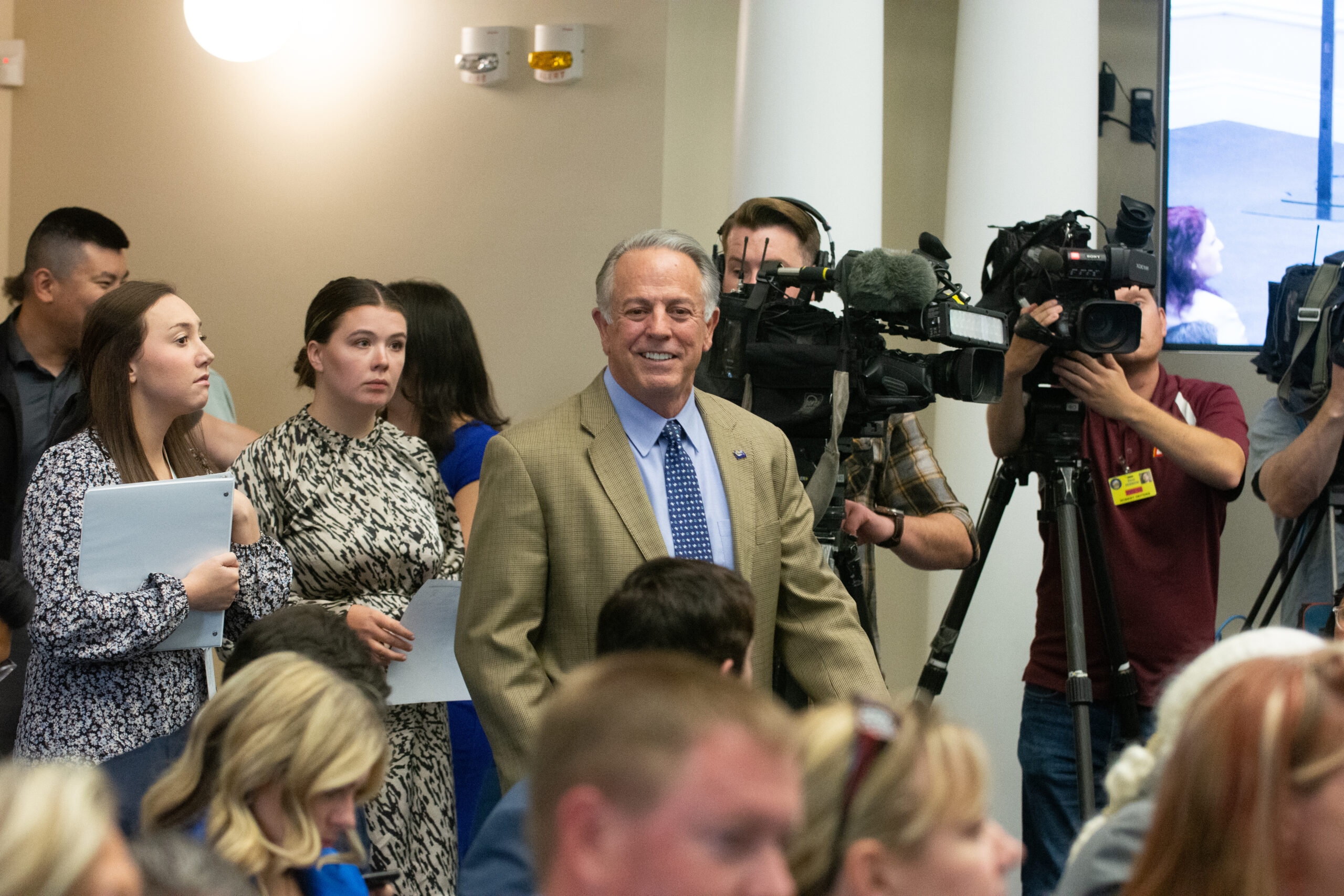 Gov. Joe Lombardo arrives at a bill signing ceremony for SB 406, introduced by Secretary of State Cisco Aguilar, which would make it a felony for any person to threaten election workers, in Carson City on May 30, 2023. (David Calvert/The Nevada Independent).