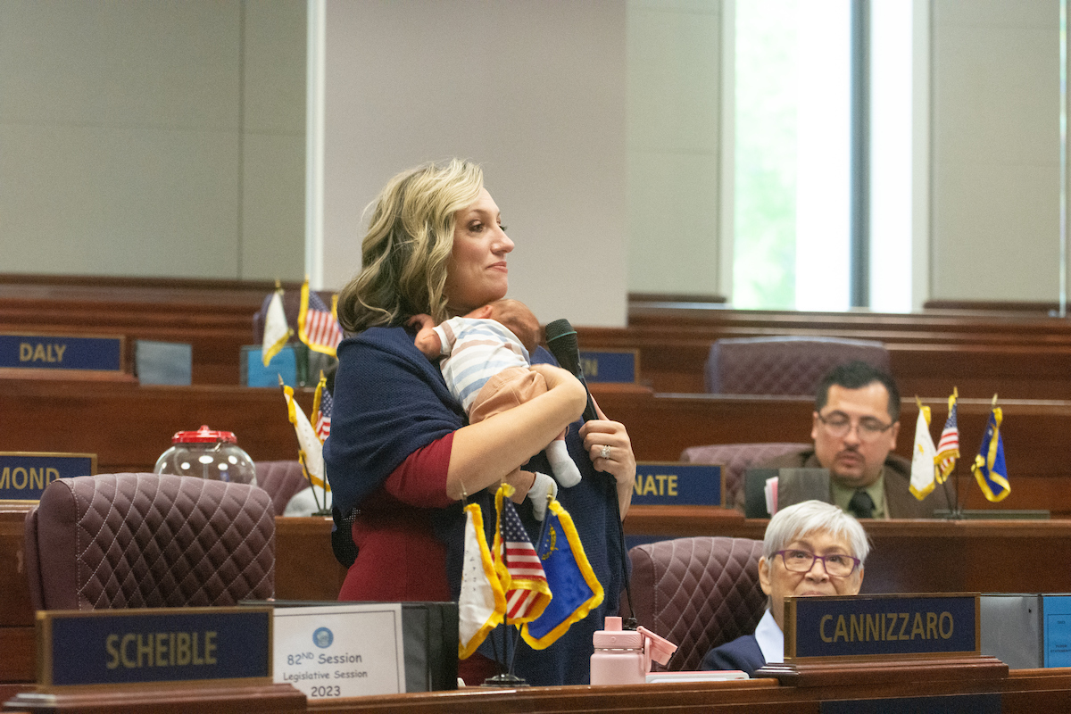 Senate Majority Leader Nicole Cannizzaro with her newborn son, Cole, inside the Legislature in Carson City on May 24, 2023. (David Calvert/The Nevada Independent).