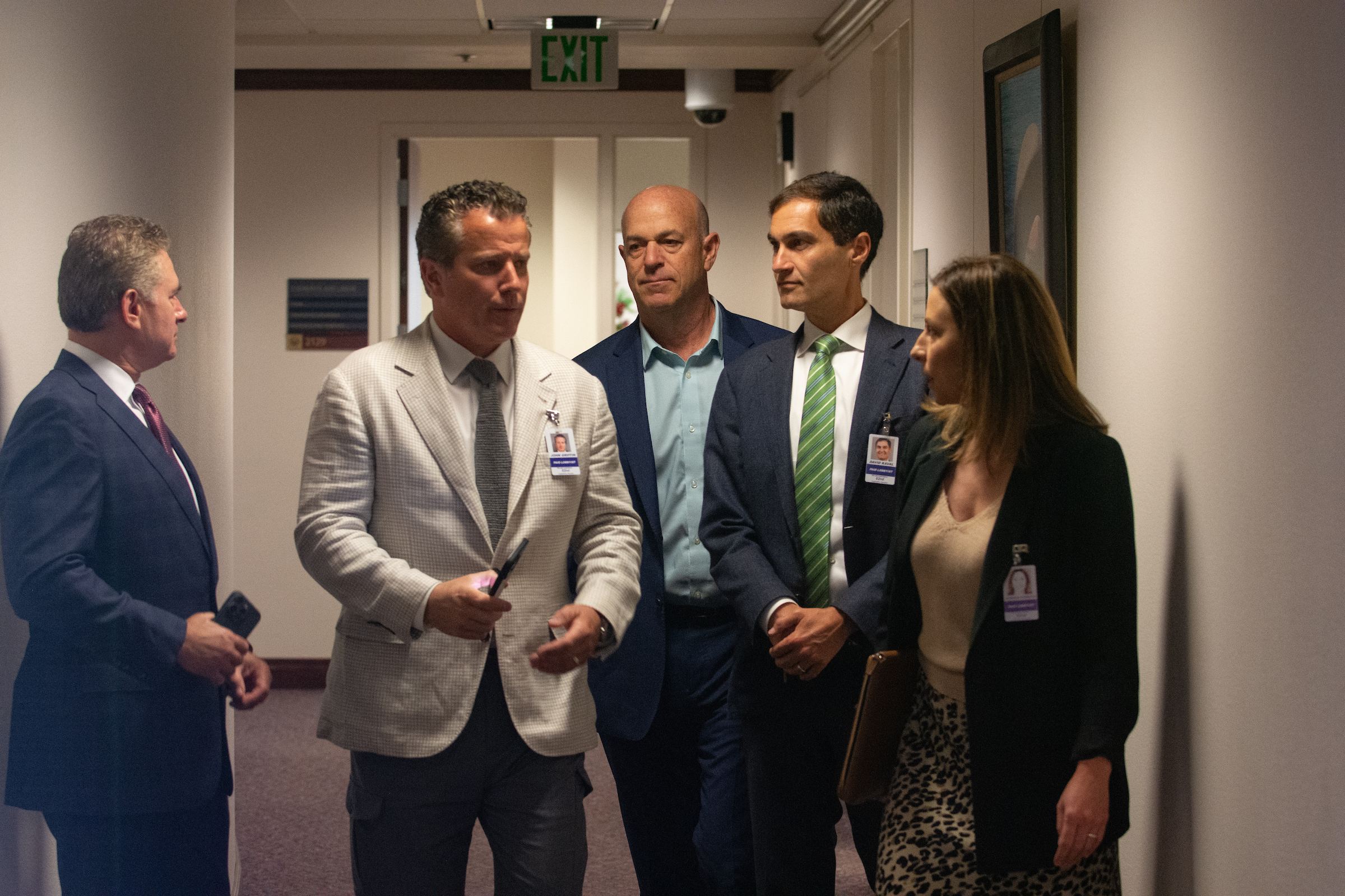 From left, lobbyists Alfredo Alonso and John Griffin, Oakland Athletics owner John Fisher, President Dave Kaval and lobbyist Jessica Ferrato inside the Legislature in Carson City on May 31, 2023. (David Calvert/The Nevada Independent).