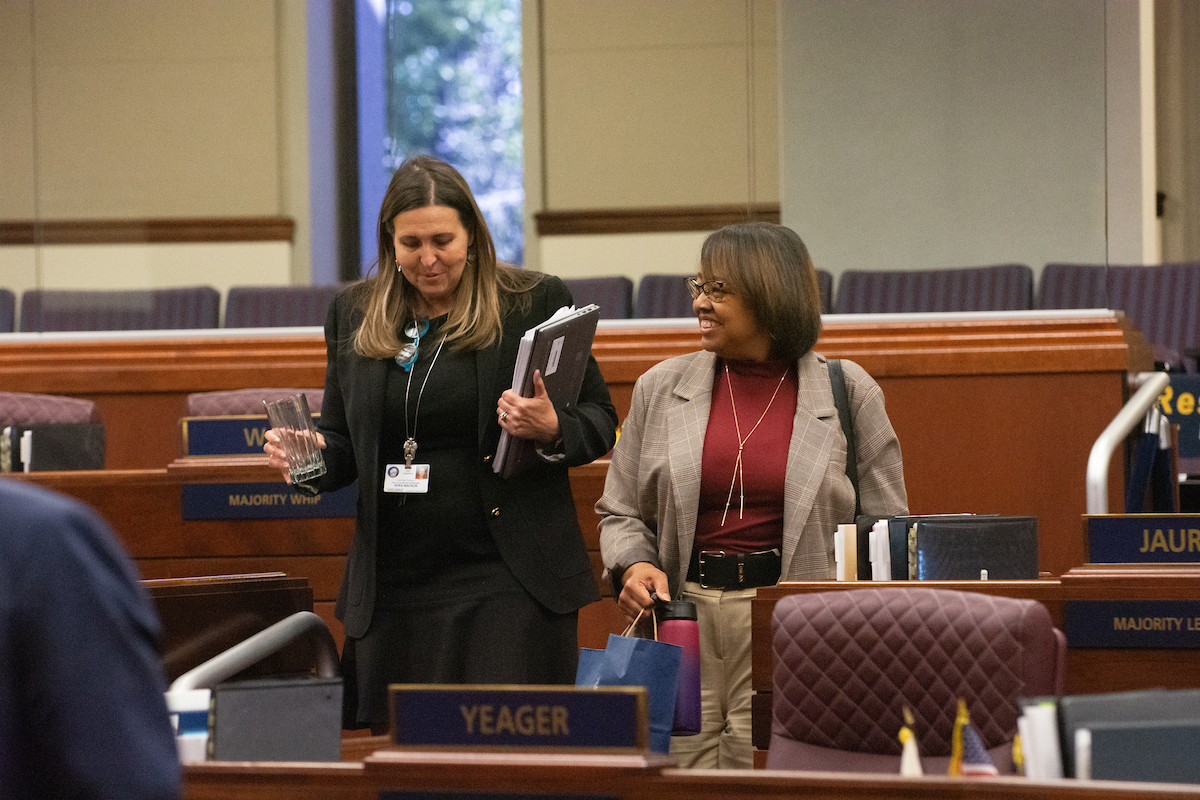 From left, Assemblywomen Shea Backus (D-Las Vegas) and Danielle Monroe-Moreno (D-North Las Vegas) inside the Legislature in Carson City on May 30, 2023. (David Calvert/The Nevada Independent).