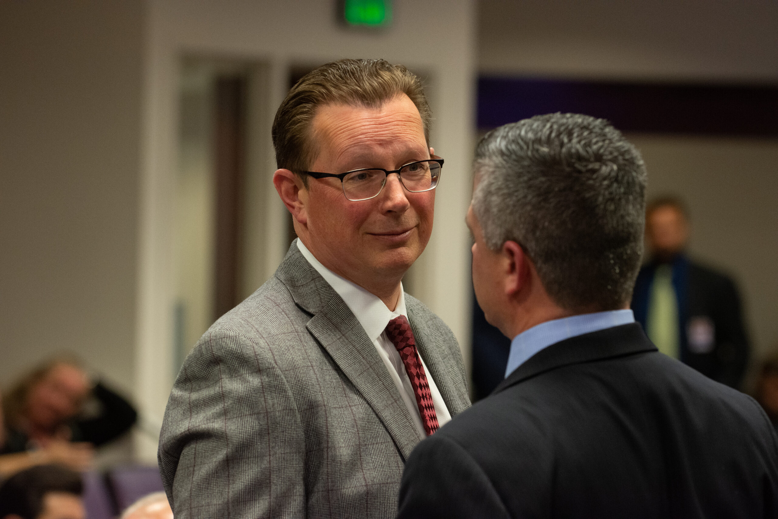 Gov. Joe Lombardo's Chief of Staff Ben Kieckhefer speaks with Assembly Speaker Steve Yeager before a hearing for SB509, the proposed stadium bill for the Oakland Athletics, on Monday, May 29, 2023, at the Legislature in Carson City. (David Calvert/The Nevada Independent).