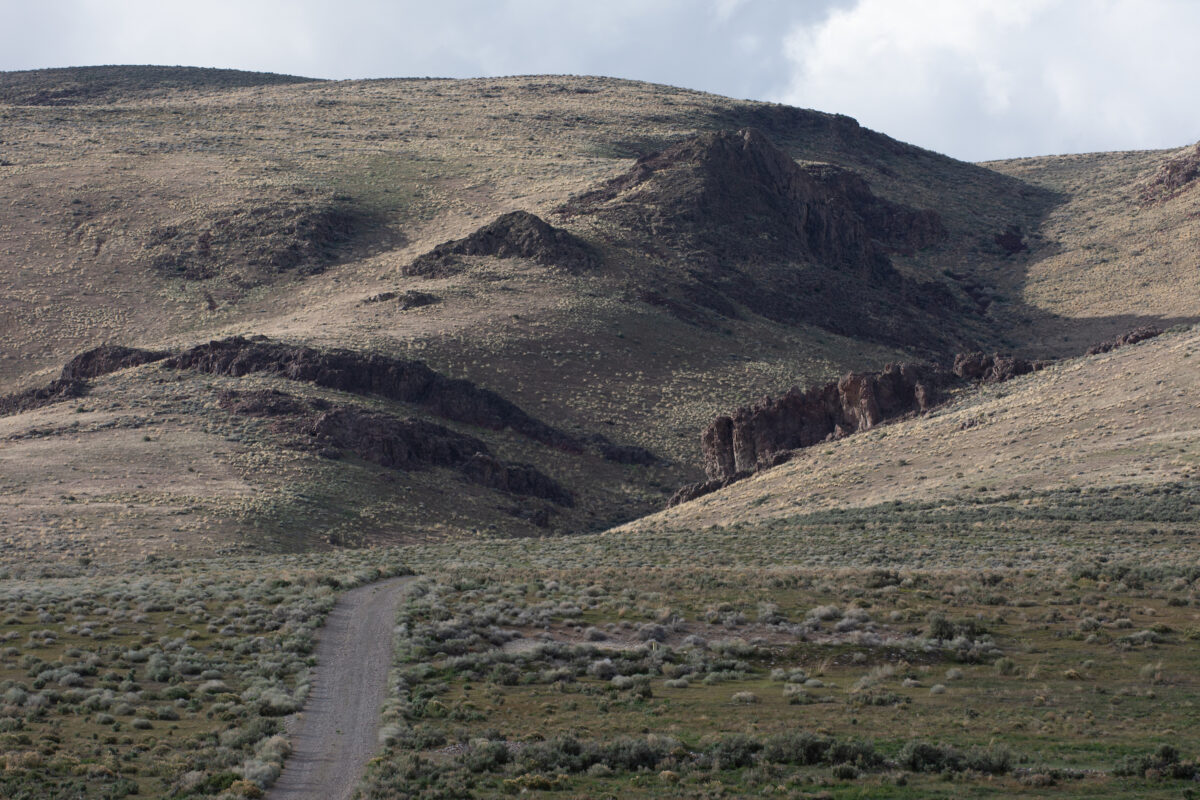 A road cuts into the Montana Mountains on April 30, 2022, near the site where the Thacker Pass lithium mine will be constructed. 