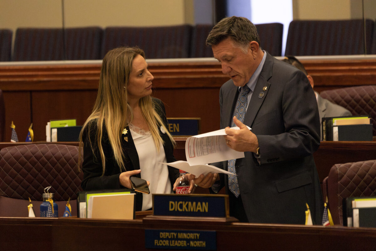 Assemblywoman Danielle Gallant (R-Las Vegas) speaks to Assemblyman Philip “P.K.” O’Neill (R-Carson City) during the 35th special session of the Legislature on June 14, 2023, in Carson City. (Trevor Bexon/The Nevada Independent).