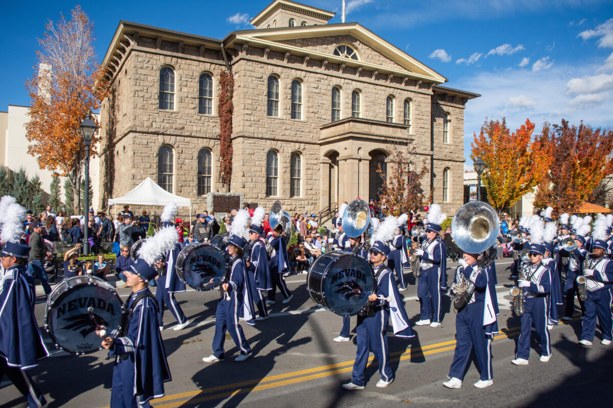 The UNR marching band performs in front of the Nevada State Museum in Carson City during the Nevada Day Parade on Oct. 30, 2021.