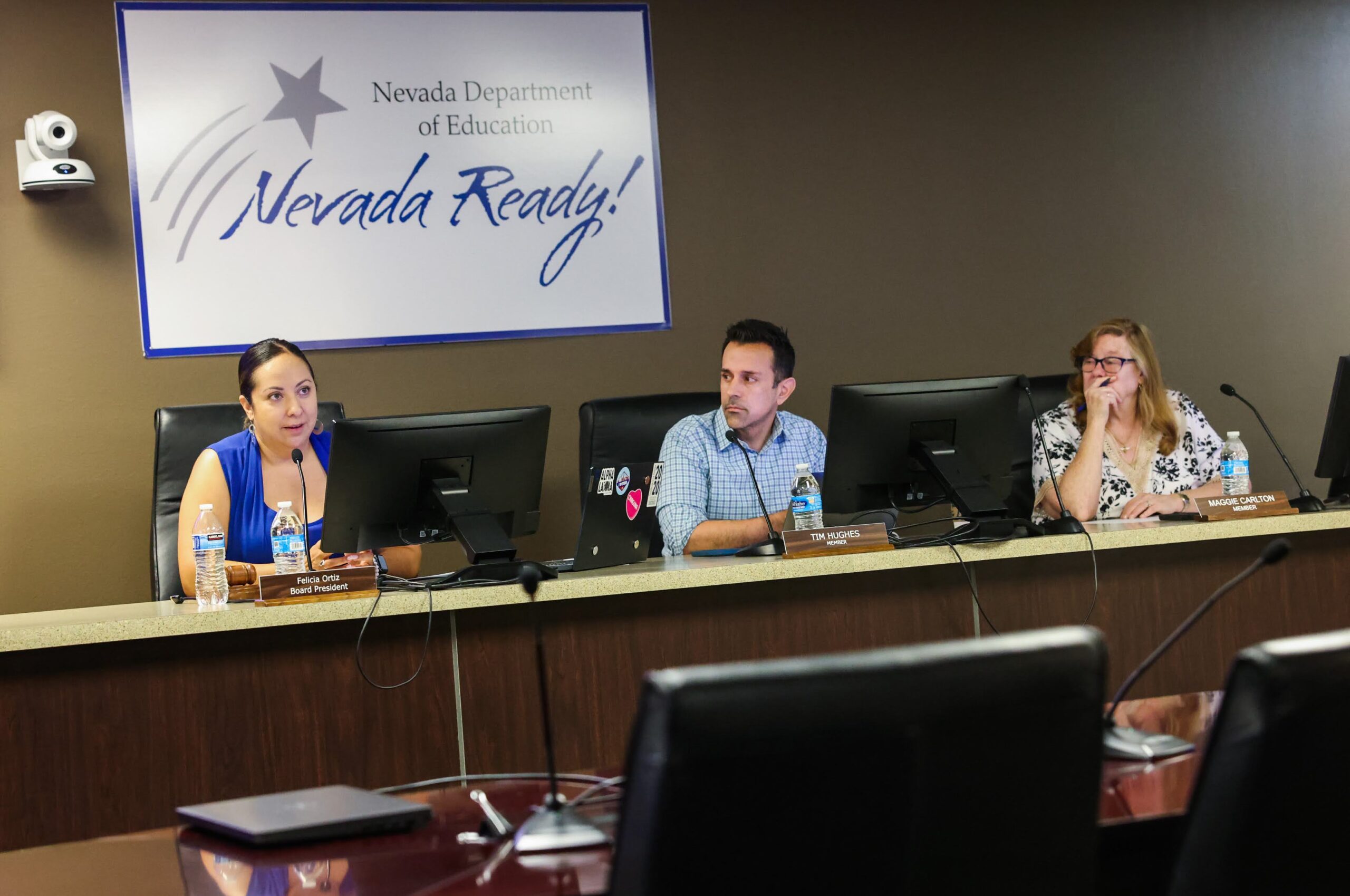 Nevada State Board members Felicia Ortiz, president, left, Tim Hughes, and Maggie Carlton, board meeting in Las Vegas on Wednesday, June 14, 2023. (Jeff Scheid/The Nevada Independent).