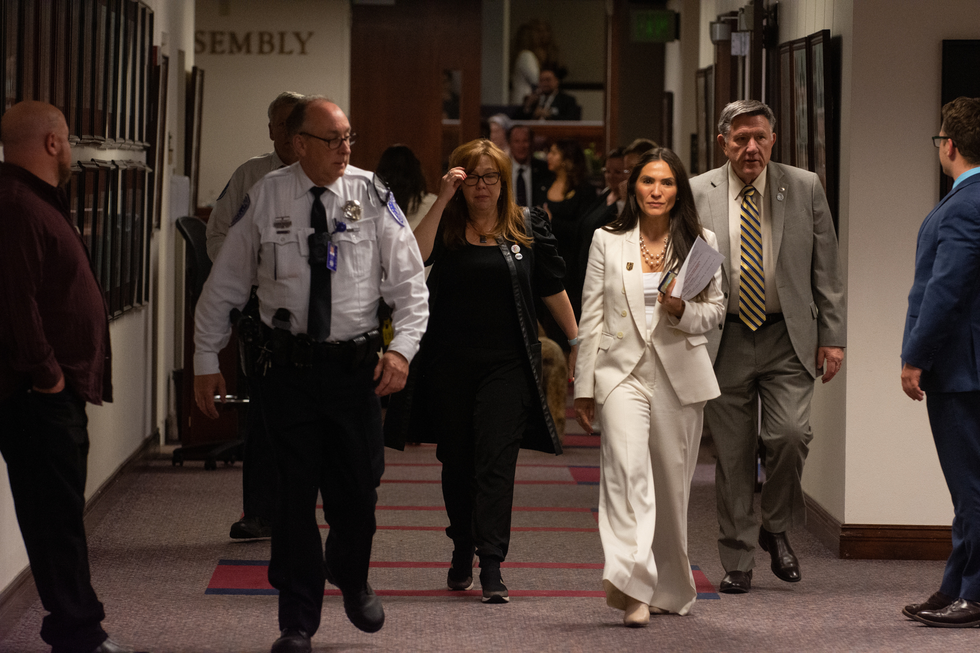 From left, Assembly members Shannon Bilbray-Axelrod (D-Las Vegas), Sandra Jauregui (D-Las Vegas) and P.K. O'Neill (R-Carson City) leaving the Assembly floor an hour before midnight on Monday, June 5, 2023. (David Calvert/The Nevada Independent).