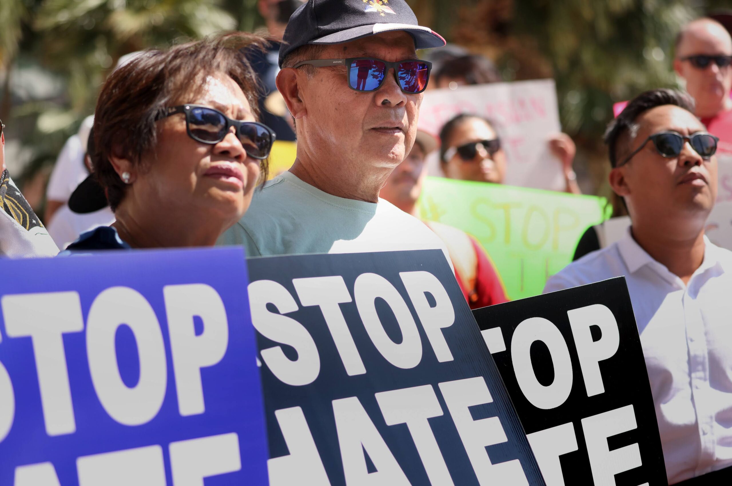 Amadeo Quindara, 75, center, a victim of a hate crime, stands with community members during a Stop Asian Hate Rally in front of the Regional Justice Center on Thursday, June 29, 2023. (Jeff Scheid/The Nevada Independent).