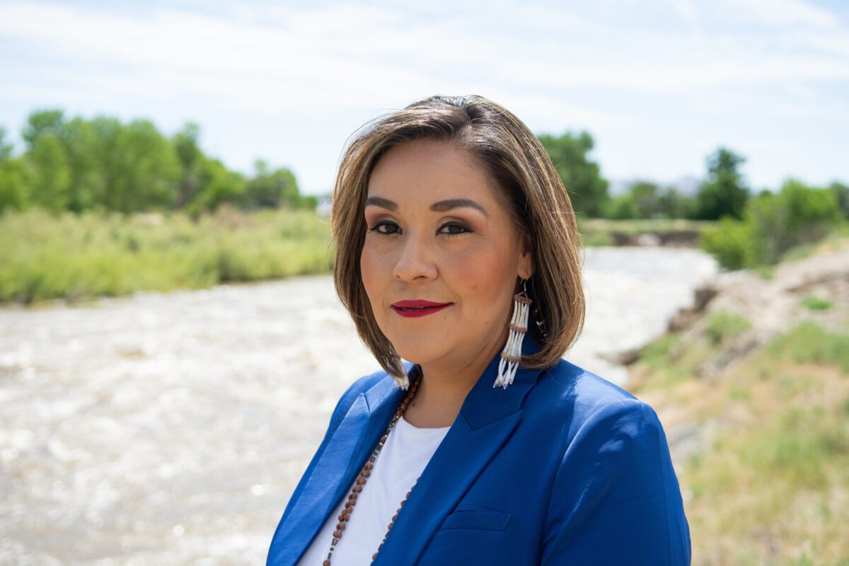 Andrea Martinez, chair of the Walker River Paiute Tribe, poses for a portrait next to the river on the Reservation on June 22, 2023. (David Calvert/The Nevada Independent)