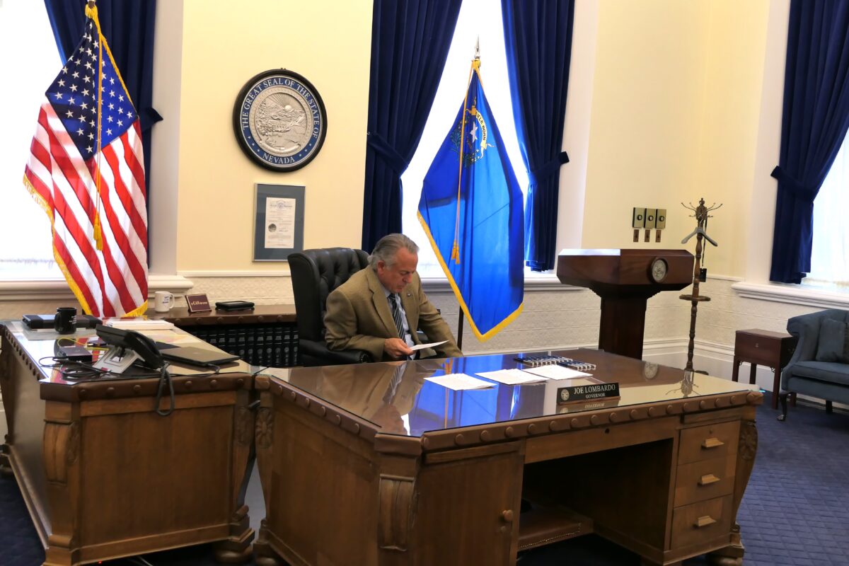 Gov. Joe Lombardo at his desk inside the governor's office prior to SB80's ceremonial bill signing in Carson City on Thursday, June 15, 2023. (Carly Sauvageau/The Nevada Independent).