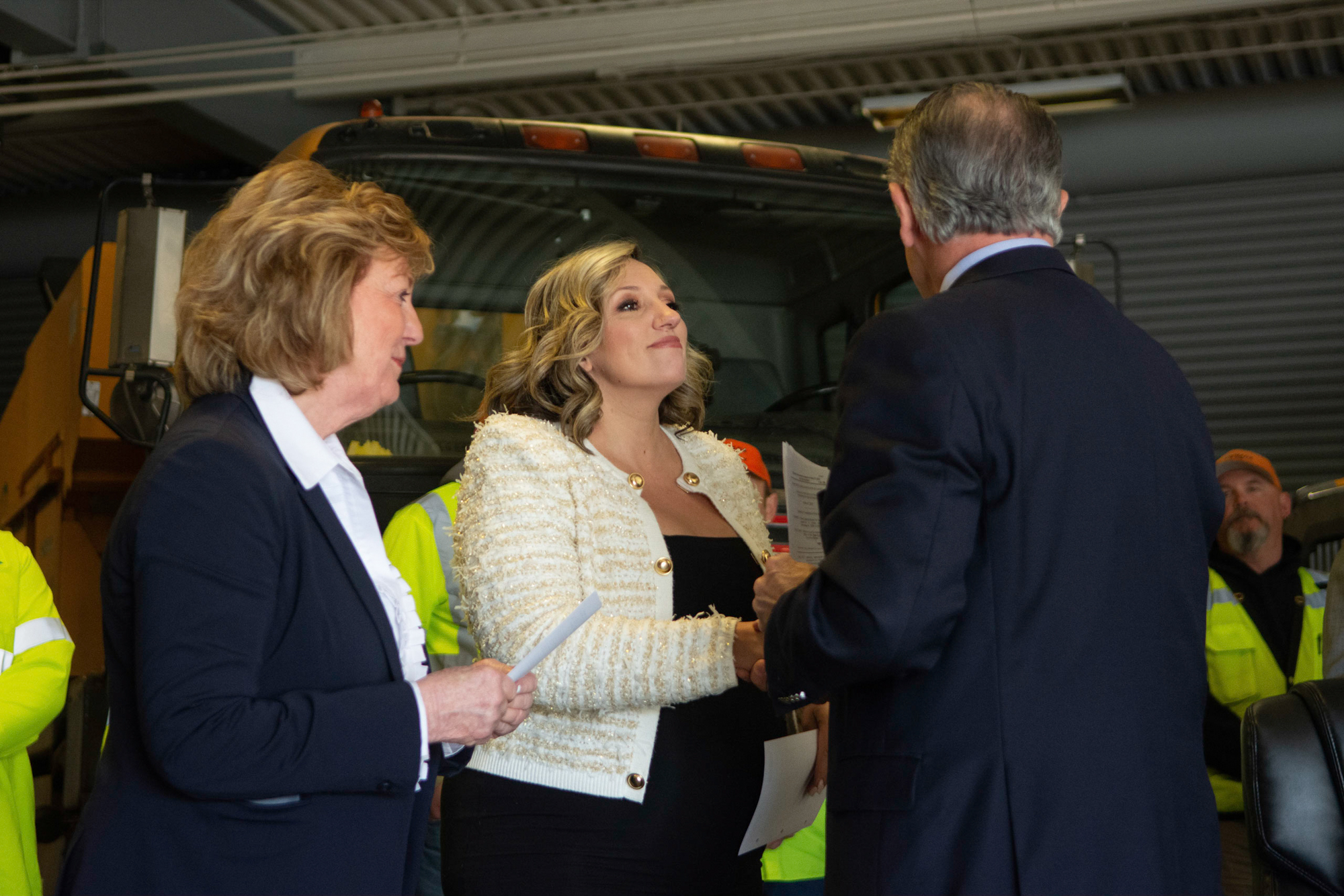 Gov. Joe Lombardo, Sen. Marilyn Dondero-Loop (D-Las Vegas), left, and Senate Majority Leader Nicole Cannizzaro (D-Las Vegas) following a signing ceremony for AB268 at the Nevada Department of Transportation's headquarters on April 4, 2023, in Carson City.