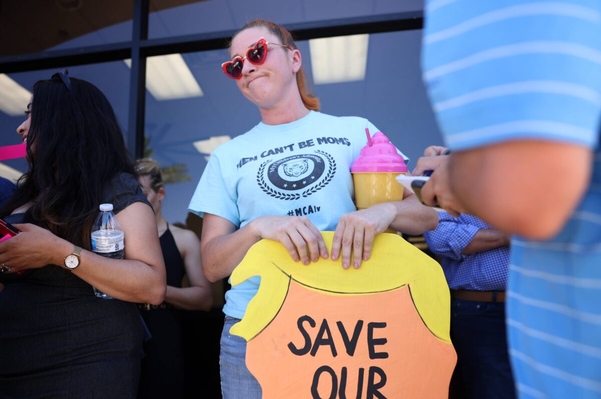 Stephanie Kinsley, 41, stands in line to hear former President Donald Trump speak at Fervent: A Calvary Chapel Church during a volunteer outreach event in Las Vegas on Saturday, July 8, 2023. (Jeff Scheid/The Nevada Independent)