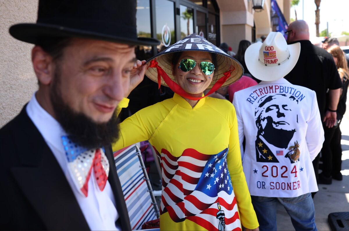 Alex Dan and Kimberly Trump stands in line to hear former President Donald Trump speak at Fervent: A Calvary Chapel Church during a volunteer outreach event in Las Vegas on Saturday, July 8, 2023. (Jeff Scheid/The Nevada Independent)
