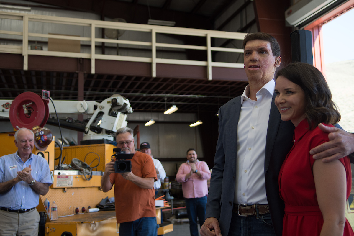 Sam Brown and his wife, Amy Brown, after he announces a Republican bid for Senate at Bragg Crane Service in Sparks on July 10, 2023. (David Calvert/The Nevada Independent).