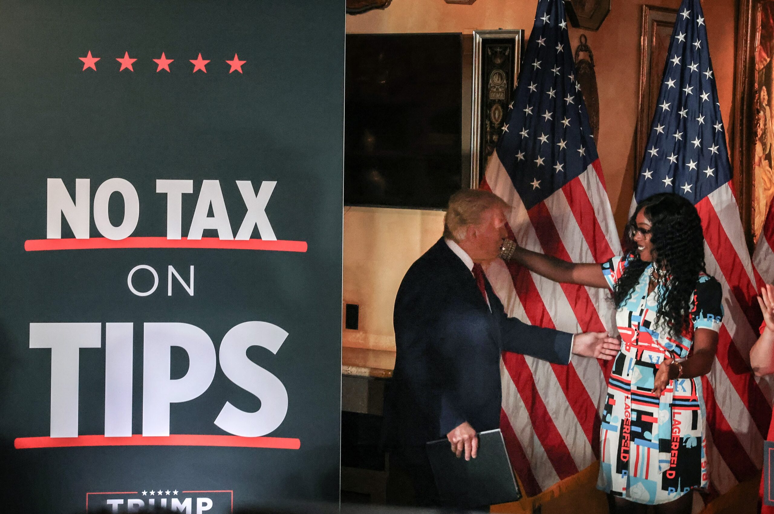 Then-candidate Donald J. Trump hugs a supporter during a campaign rally at ll Toro E La Capra restaurant in Las Vegas on Aug. 23, 2024.