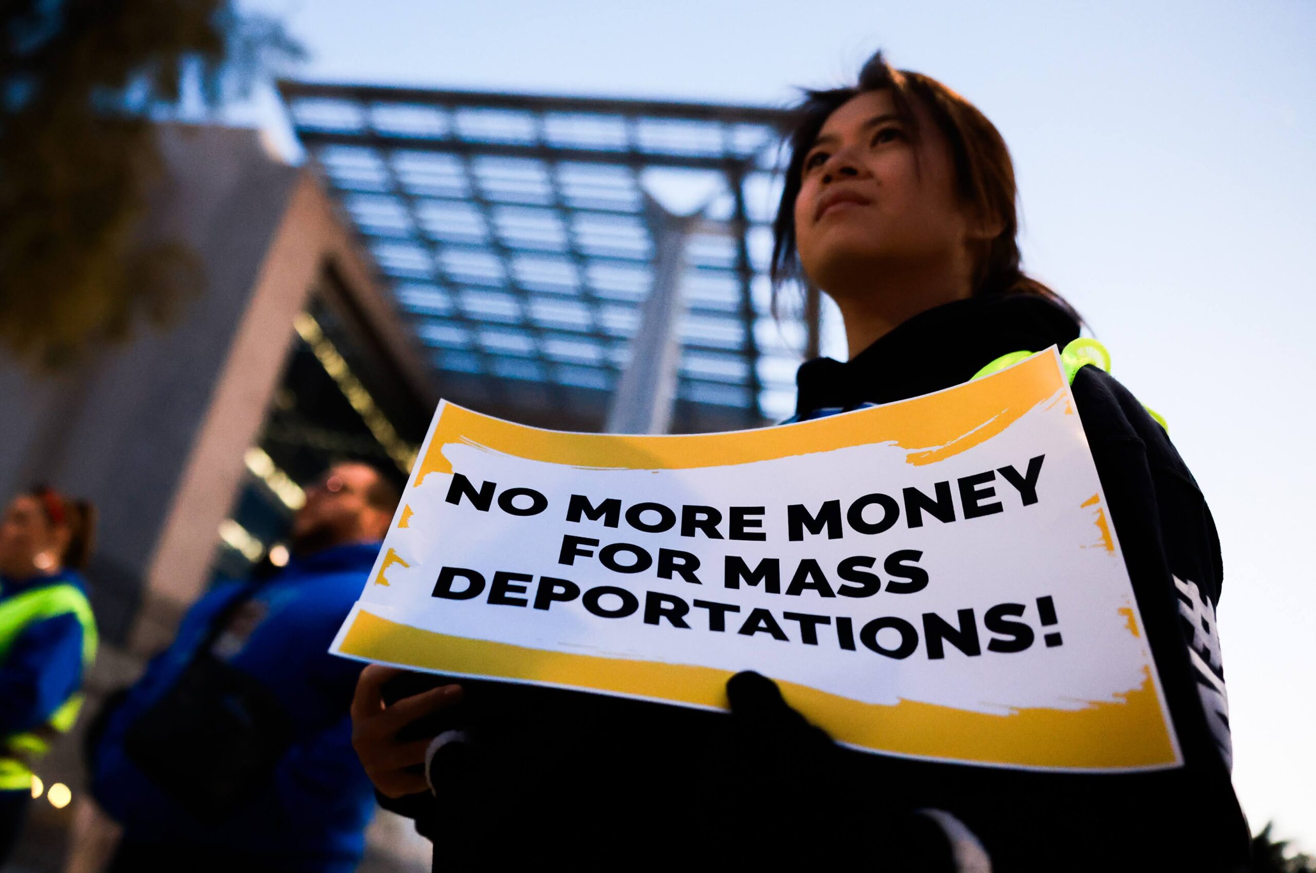Pro-immigration group protests in front of Lloyd D. George Federal Courthouse.