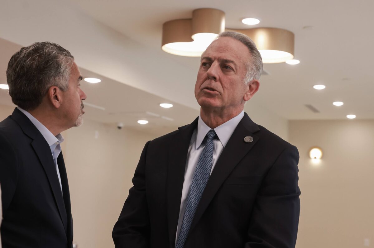 Peter Guzman, left, president of the Latin Chamber of Commerce, and Gov. Joe Lombardo tour Ovation, an affordable housing project in Las Vegas.