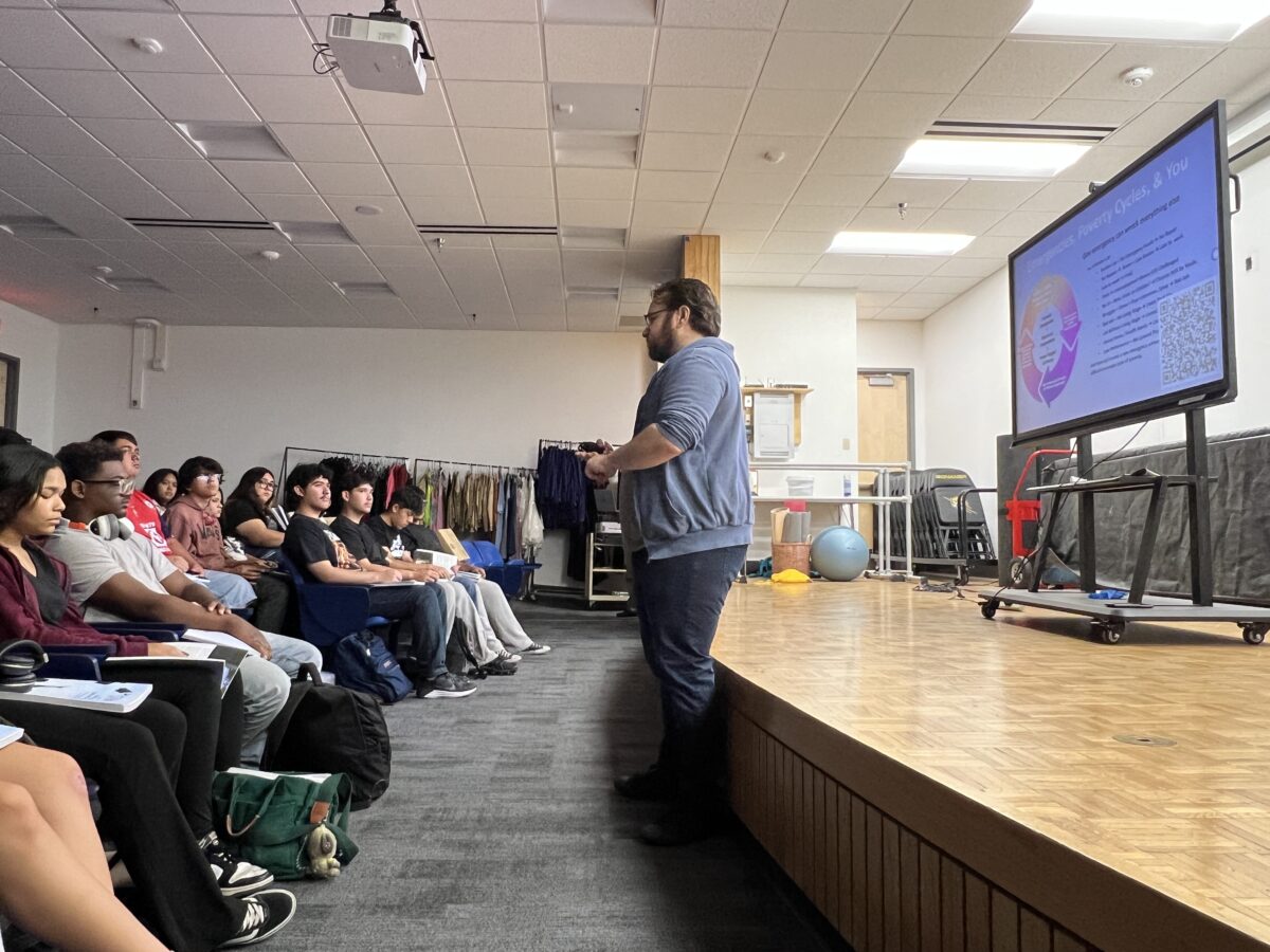 Mike Kamer, executive director of Project REAL, a Las Vegas-based nonprofit, talks with students at Bonanza High School on April 23, 2025.