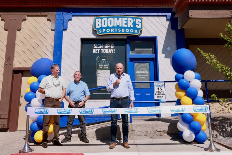 Boomer's Sportsbook CEO Joe Asher attends the ribbon cutting for the operation's opening in Elko with Elko Mayor Reece Keener, left, and Nevada Casino Holdings CEO David Zornes.