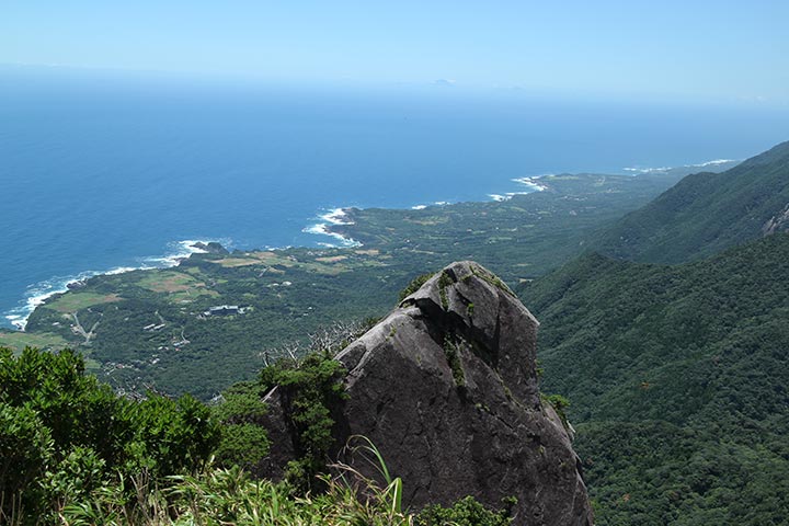 Climbing the steep cliffs and Mt. Mocchomu-dake, looking down on the nature of Yakushima Island and the ocean