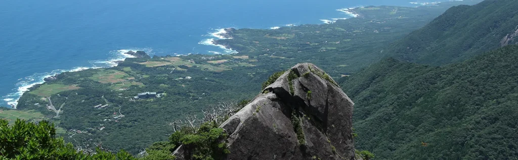 Climbing the steep cliffs and Mt. Mocchomu-dake, looking down on the nature of Yakushima Island and the ocean