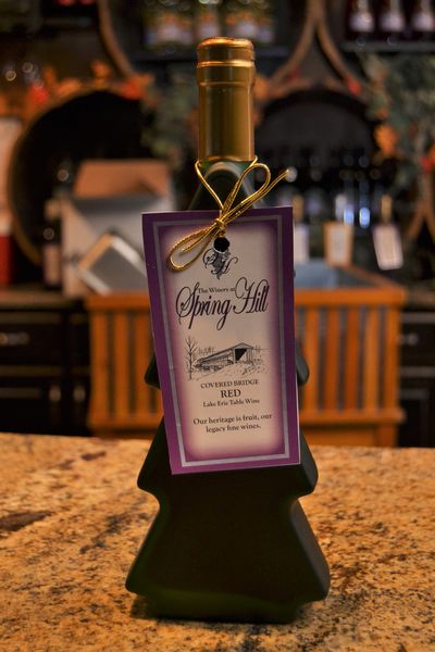 Green Christmas Tree Bottle with Covered Bridge Red