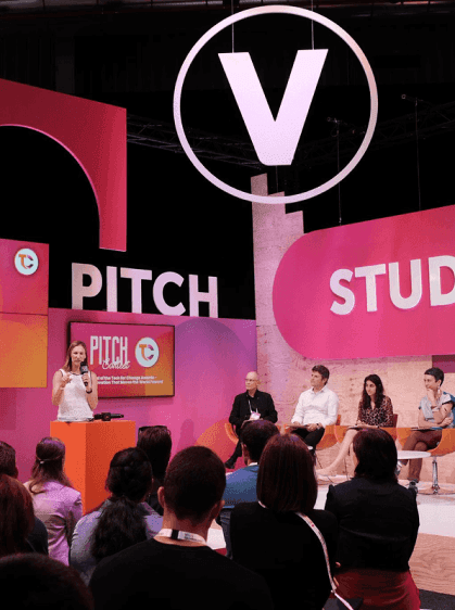 Pitch on stage to decision-makers and investors