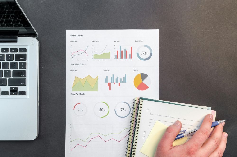 analytics charts on a piece of paper on a desk