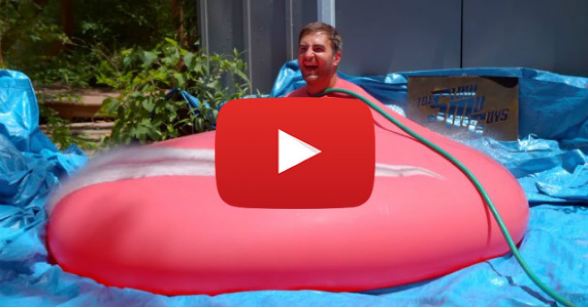 Giant Water Balloon Explodes With Man Sitting Inside