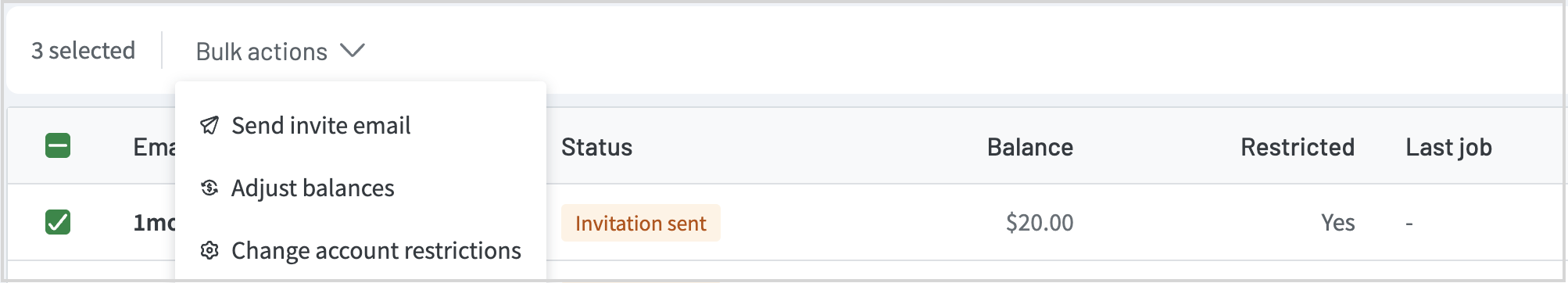 Users list with the Bulk actions menu showing three options: Send invite email, Adjust balances, and Change account restrictions