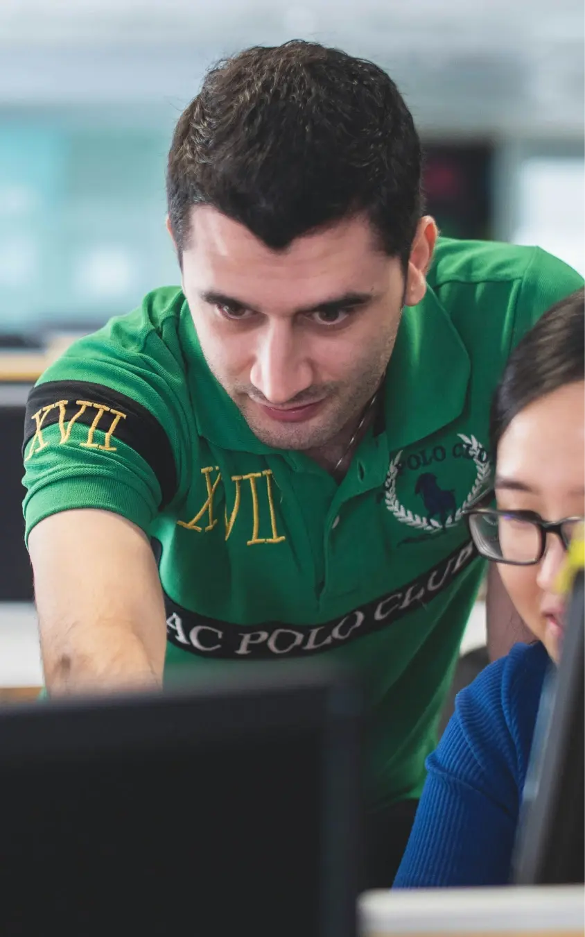 Teacher in front of computer