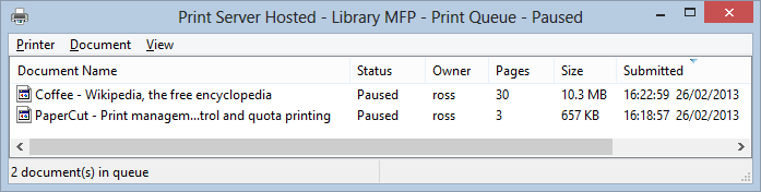 A view of the print queue showing test jobs paused in the print queue